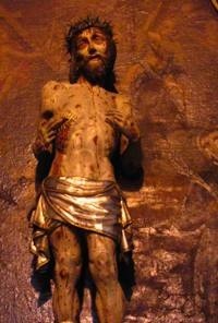 A statue of a person with a beard
AI-generated content may be incorrect.