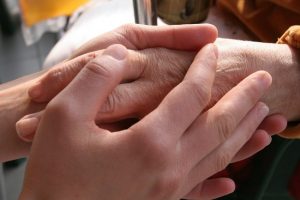 A close-up of a person holding an old hand AI-generated content may be incorrect.