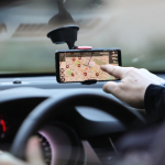 A person using a phone to search a location AI-generated content may be incorrect.