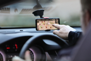 A person using a phone to search a location AI-generated content may be incorrect.