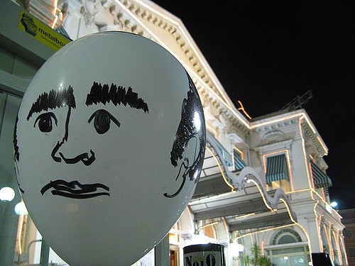 A balloon with a face drawn on it AI-generated content may be incorrect.